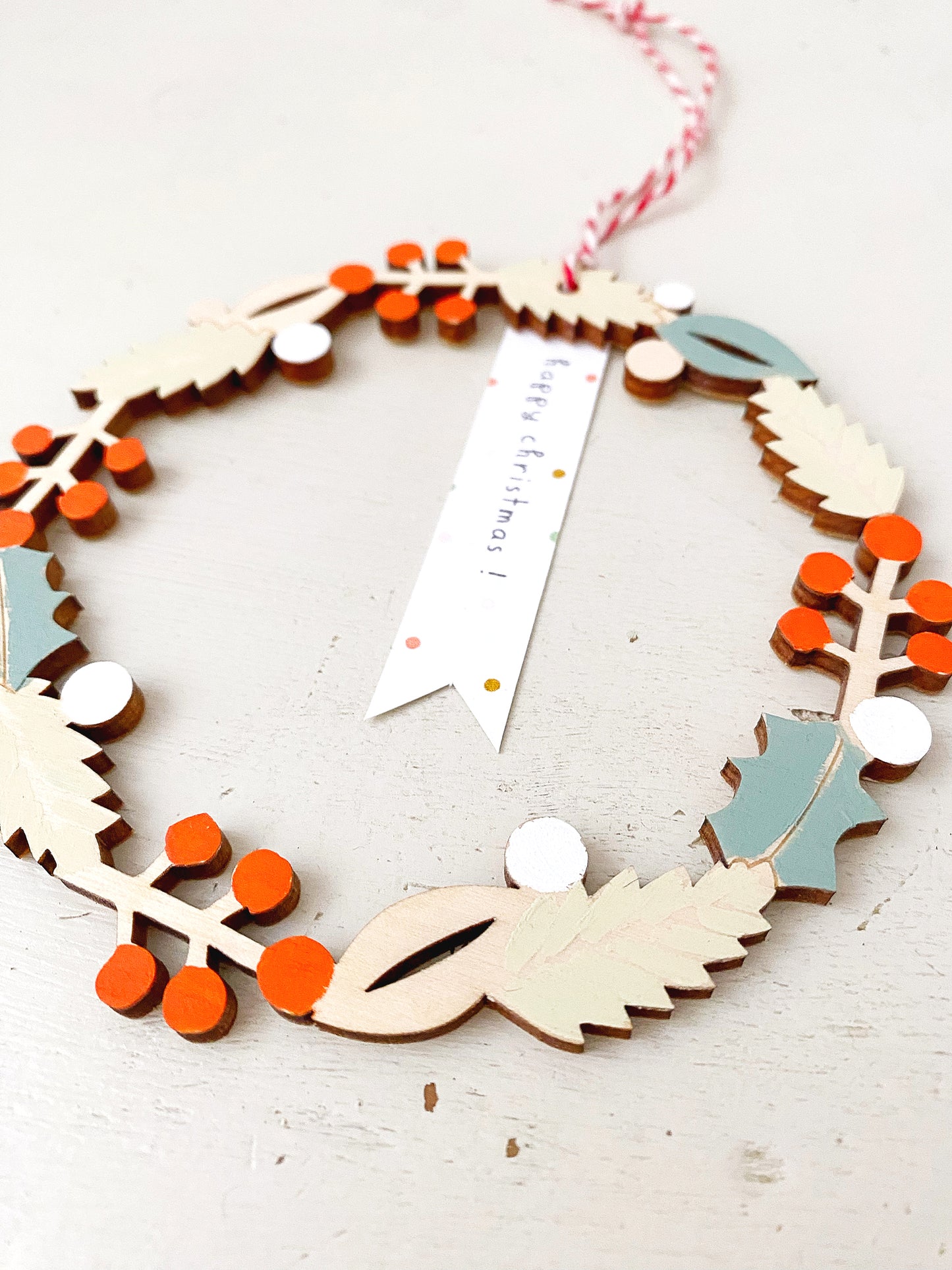 Christmas wreath decoration. Hand-painted eco-friendly wooden keepsake.