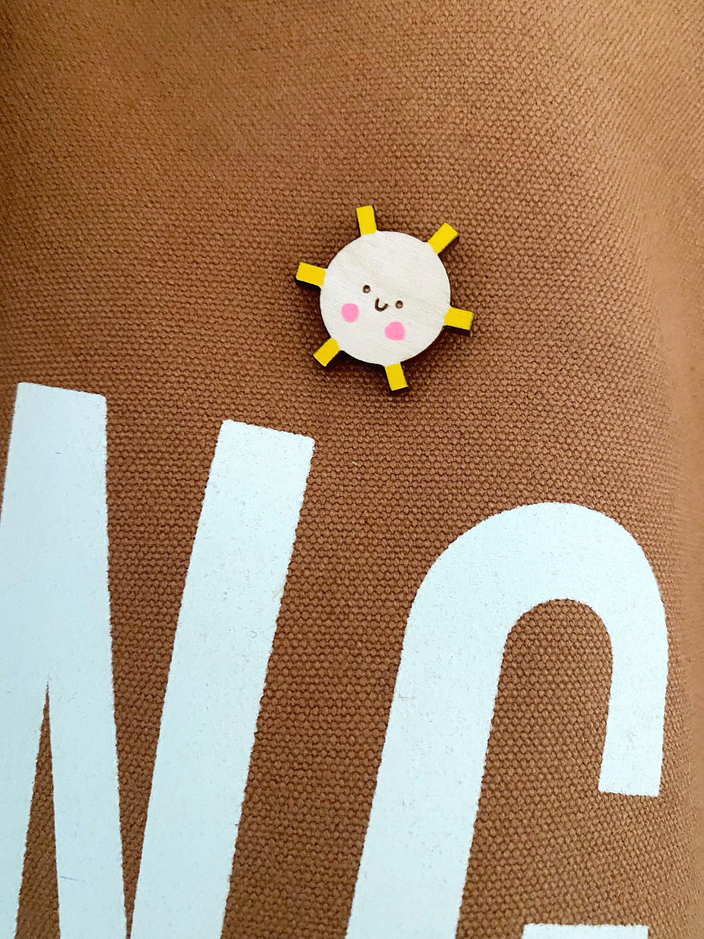 Smiley sunshine pin badge