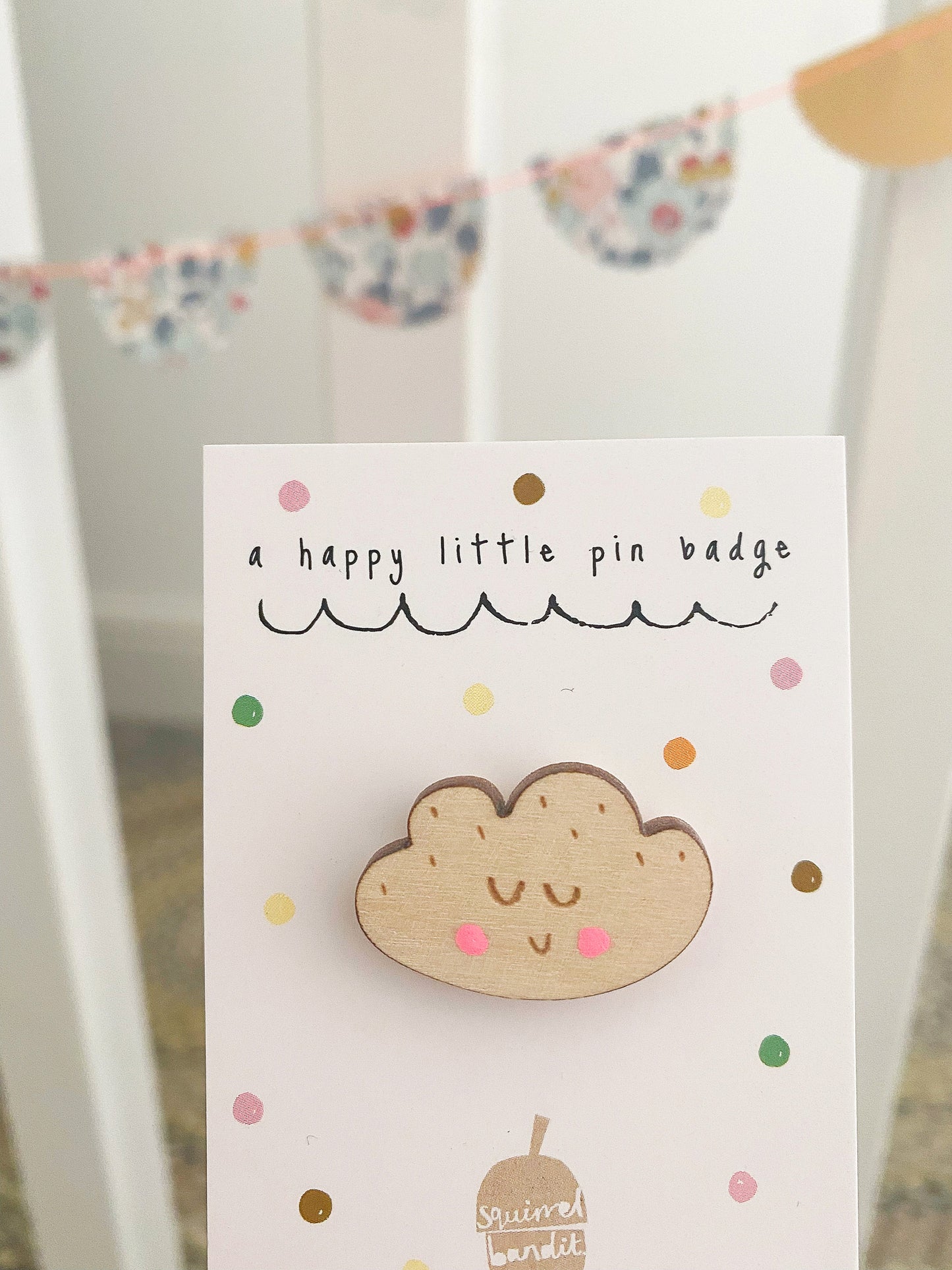 Smiley cloud pin badge